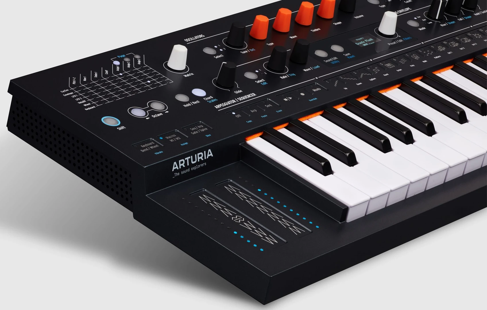 Close three-quarter view of the black Arturia MiniFreak hybrid synthesizer showing its controls, touch strips, and keyboard.